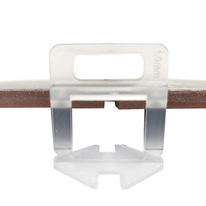 Zestaw system poziomowania płytek 030254NB klipsy 1 mm 1000 szt + system poziomowania płytek 030253NB kliny 200 szt zdjęcie nr 2